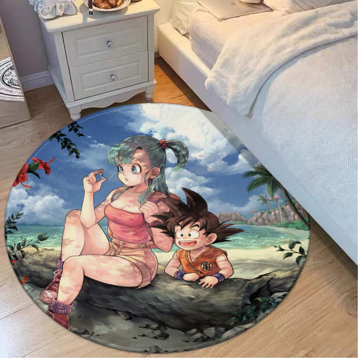 Bulma Sitting on a Tree and Kid Goku at the Beach Blue Graphic DBZ round mat