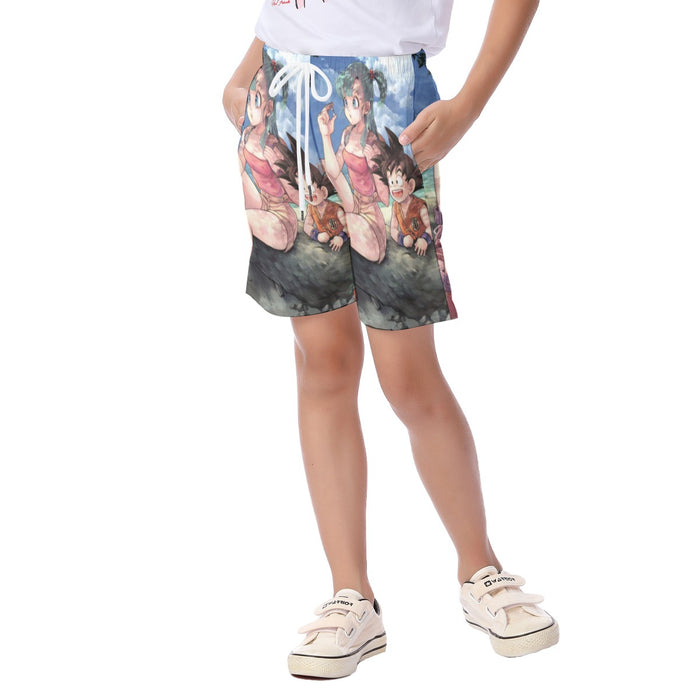 Bulma Sitting on a Tree and Kid Goku at the Beach Blue Graphic DBZ  Kid's Beach Shorts