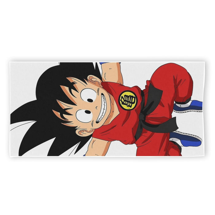 DBZ Jumping Kid Goku In His Training Suit Beach Towel