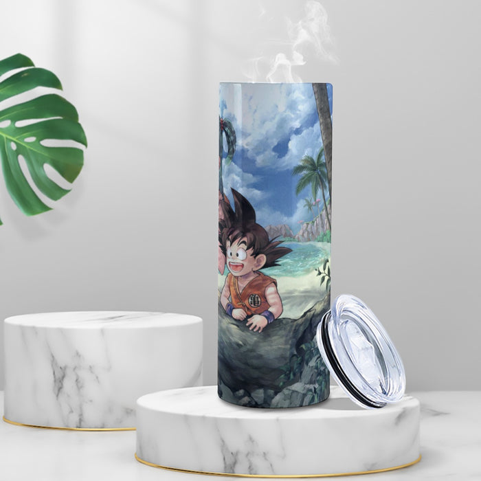 Bulma Sitting on a Tree and Kid Goku at the Beach Blue Graphic Tumbler with twinkle surface